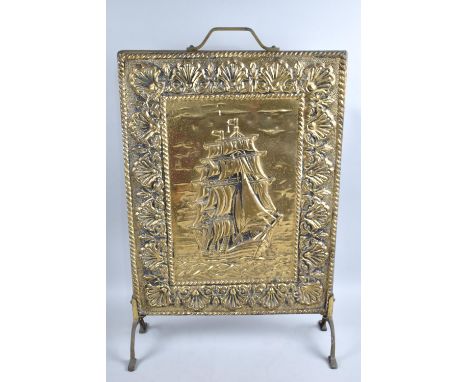 A Mid 20th Century Pressed Brass Fire Screen Decorated with Galleon, 39cms Wide 