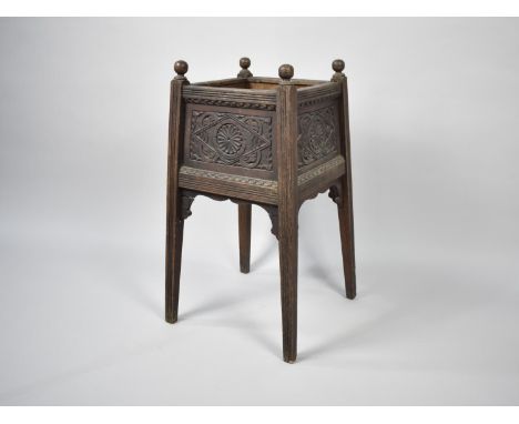 An Edwardian Oak Planter Stand with Carved Panel, Ball Finials, 86.5cms High