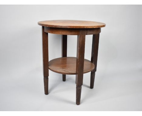 A Circular Occasional Table with Stretcher Shelf, 54.5cms Diameter 