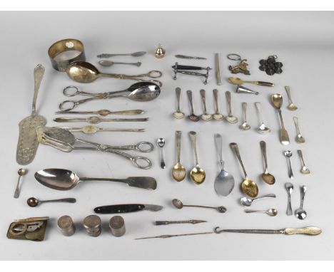 A Collection of Various Curios and Metalwares to Comprise Flatware, Spoons, White Metal Bottle Flask Tops, Griffin Mount, Pew