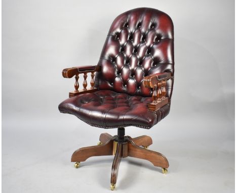 A Modern Leather Effect Button Upholstered Swivel Office Armchair 