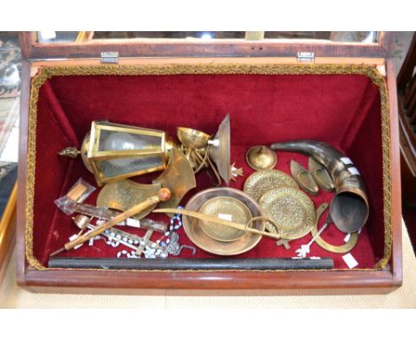 An early 20th century table top bijouterie cabinet, a Victorian horn and carnelian walking stick handle, a brass horseshoe, a