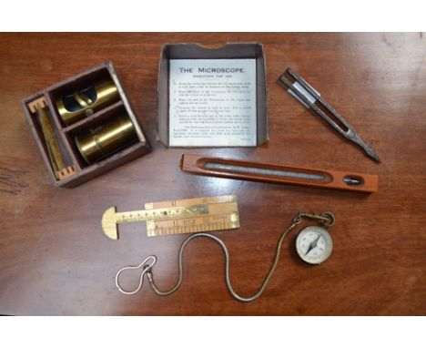 A Victorian miniature brass microscope, a pocket compass, tuning fork, carpenter's pocket rule; a thermometer (5)