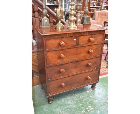 A Victorian mahogany chest of drawers, two short cockbeaded drawers over three graduated long, button handles, turned feet, 1