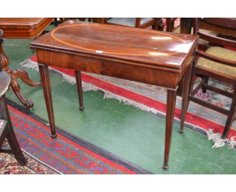 A 19th century mahogany rectangular concertina-action card table, folding top inlaid with a satinwood oval and  enclosing a b