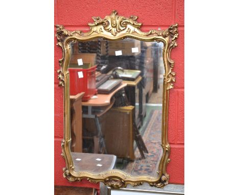 English school, Church from the bank of the pond, oil on canvas; an oak framed canted rectangular wall mirror; a gilt framed 