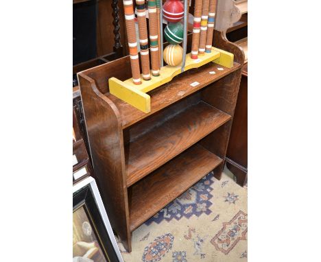 An oak three shelf bookcase; a card table with folding legs (2)