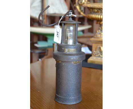 An early battery powered cast iron colliery lamp. No S392
