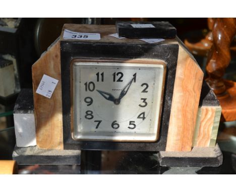 An Art Deco marble mantel clock, eight day movement