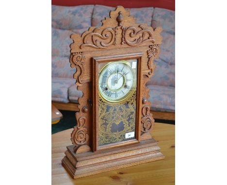 An American oak mantel clock, by Jerome & Co, , New Haven Connecticut, eight day, twin winding holes, Roman numerals, pendulu