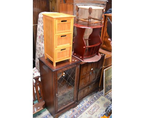 An oak TV cabinet; an oak stereo cabinet; an oak rope seated stool; a magazine rack; a three drawer bedside cabinet (5)