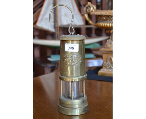 An Eccles miners lamp stamped to front with Cymru