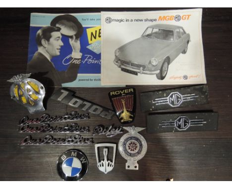 A selection of motor car hood badges and ephemera including MG AA Rover etc