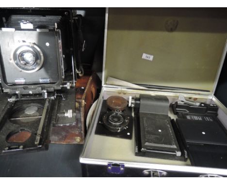 A MPP field camera and case with a case of similar format accessories