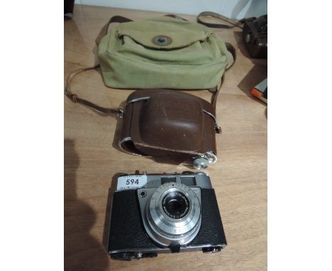 A Kodak Retinette 1A camera with canvas camera bag