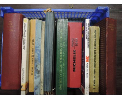 A selection of car dealership manuals brochures leaflets and parts catalogues including Dunlop 1964 trader handbook