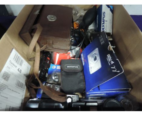 A box of enlarger parts and equipment, Olympus cameras, lenses, lights etc