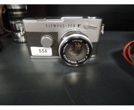 An Olympus Pen-FT half frame camera with 38mm F-Zuiko lens