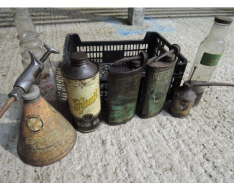A selection of motor oil and petrol fuel cans including BP Energol and Filtrate Gear oil