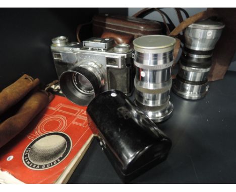 A Zeiss Ikon Contax Rangefinder camera with Universal turret, Carl Zeiss Jena Sonnar 5cm lens, and Carl Zeiss Jena 3,5cm lens