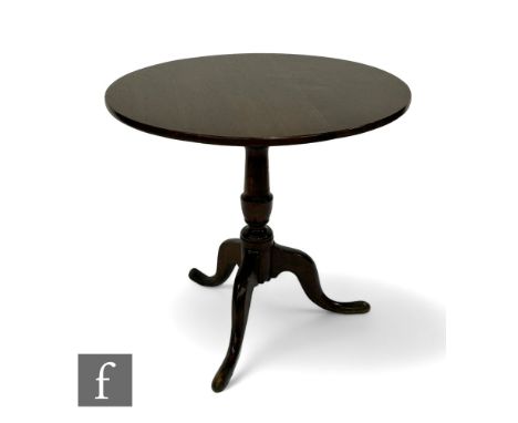 A George III mahogany circular oak tripod occasional table, turned pedestal and splayed tripod legs, width 77cm. 