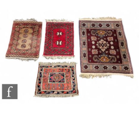 A Kayam prayer mat and three other rugs. (4) 