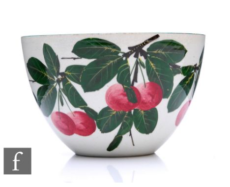 A Wemyss ware bowl painted with cherries and green leaves on a white ground, impressed mark to base, width 15cm. 
