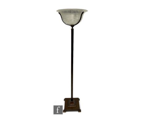 A late 1920s to early 1930s Art Deco style standard lamp and shade, reeded column to a square base and stepped feet, below a 