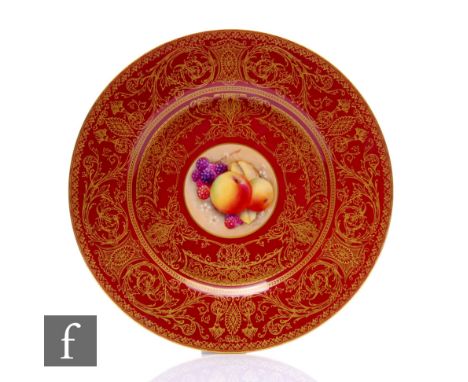 A later 20th Century Royal Worcester Fallen Fruits cabinet plate, the central round hand enamelled with apples and blackberri