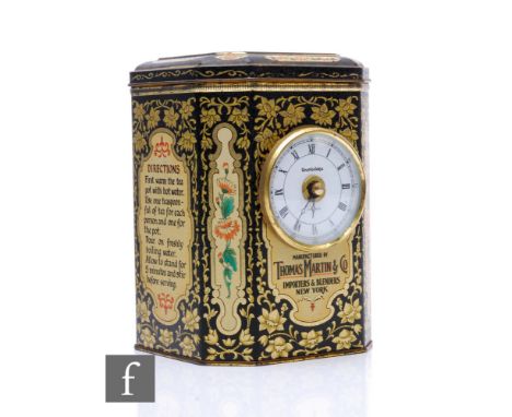 A vintage tea caddy with lithograph printed design by Thomas Martin &amp; Co, mounted with a clock attachment, height 14cm. 
