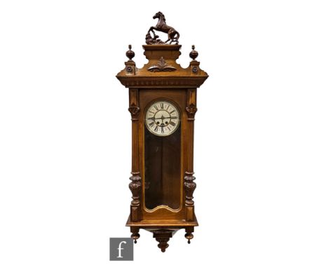 A late 19th Century style Vienna light walnut cased regulator wall clock, single weight driven movement, the circular dial en