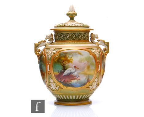 An early 20th Century Royal Worcester Hadley shape pomander and cover, the footed ovoid body with relief moulded panels with 