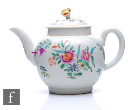 An 18th Century English porcelain teapot, possibly Worcester, the spherical footed body with domed cover and floral finial, t