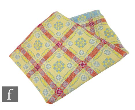 A vintage woollen Welsh tapestry pale blue, yellow and deep pink fringed edge blanket or carthen, measures 208cm x 184cm, tog