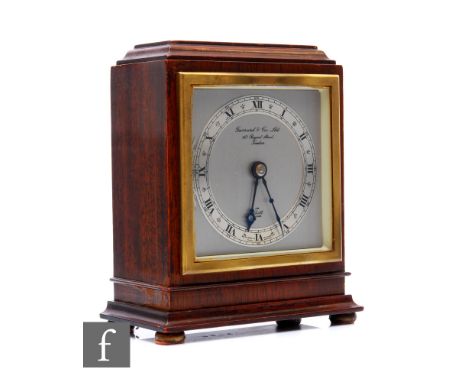 A mid 20th Century mahogany eight day Elliott&nbsp; mantel clock, Roman numerals to a silver chapter ring and dial marked Gar