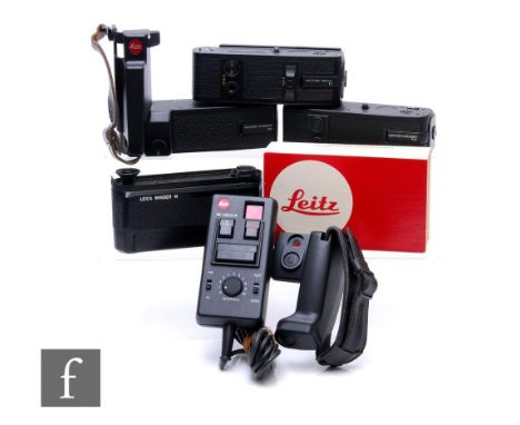 A collection of Leica camera accessories, to include winder M motordrive, R3 motor winder, R4 motor winder, R Motor Drive two