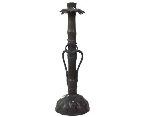 CHINESE CANDLESTICK, AND OTHER ITEMS the candlestick possibly bronze modelled as bamboo, on a fluted base, along with two fig