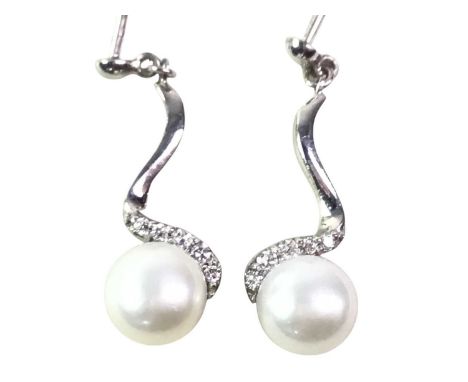 PAIR OF SILVER DROP EARRINGS, each set with single pearl