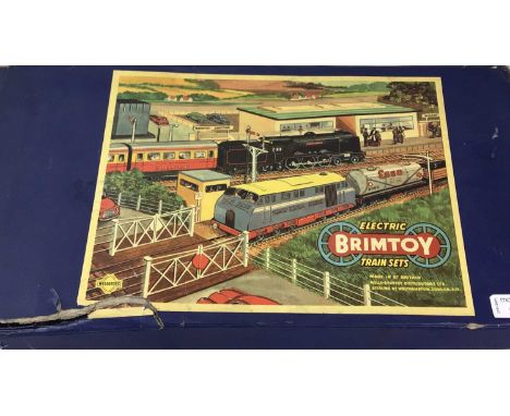 BRIMTOY ELECTRIC TRAIN SET, comprising locomotive, coaches, track and station building, in original boxbox 53cm wide