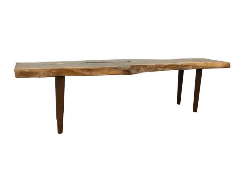 YEW WOOD BENCH, of naturalistic form, with shaped legs40cm high, 153cm wide