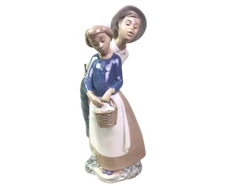 THREE NAO FIGURES, ALONG WITH A KAISER FIGURE the Nao's comprising a double figure and a figure of a man and a lady, along wi
