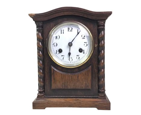 EDWARDIAN MANTEL CLOCK, the circular dial with 8 day movement, contained in an oak case27 cm high