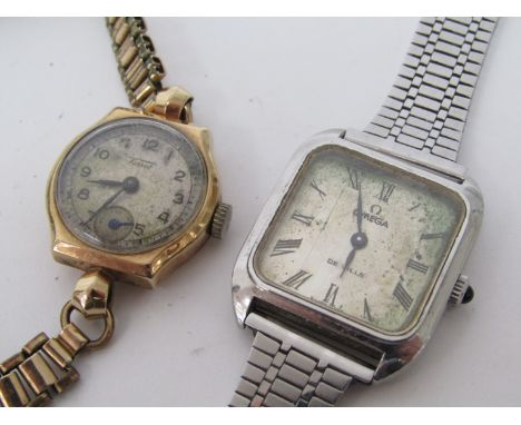 A 9ct gold cased lady's Tissot bracelet watch (bracelet gold plated), together with a lady's Omega DeVille steel cased manual