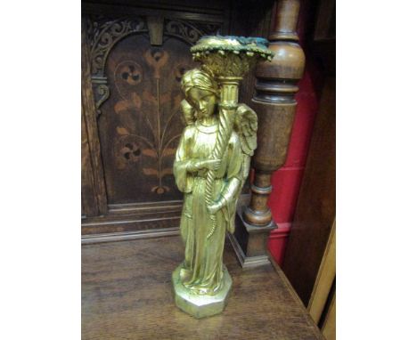 A gilt Angel figural candlestick, 49cm high