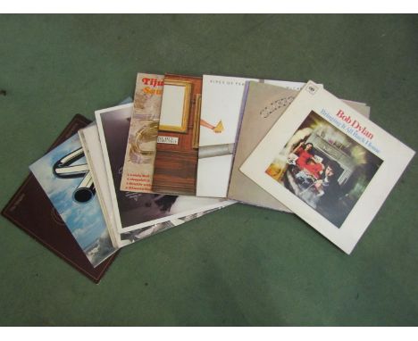 A selection of LP's including Bob Dylan, Carpenters, Status Quo, Paul McCartney etc