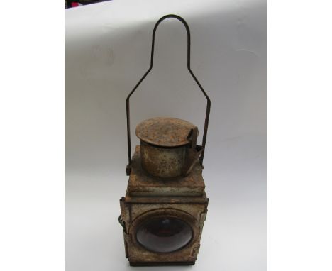 A white painted B.R. tail lamp with burner and reservoir