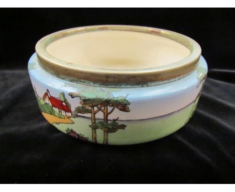 A Crownfield ceramic fruit bowl with plated rim