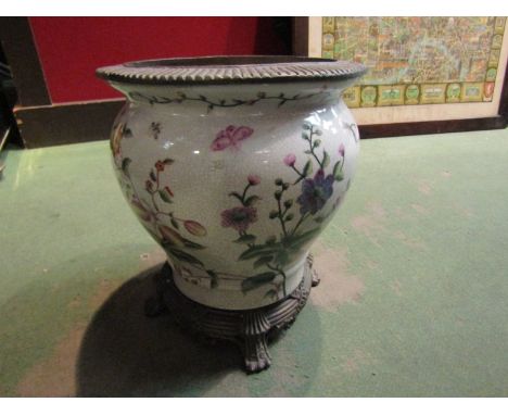 A ceramic jardiniere with metal base stand and metal rim, Chinese mark on the base, 12" high