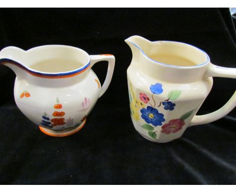 Two Arthur Wood ceramic jugs and another