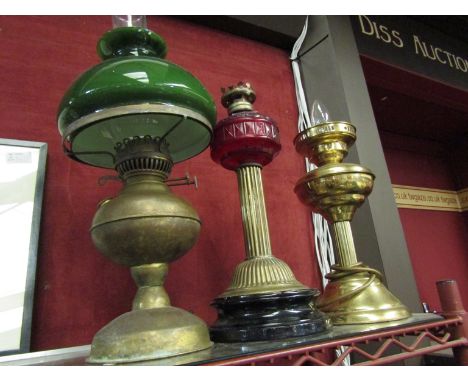 Three lamp bases including brass column form 
